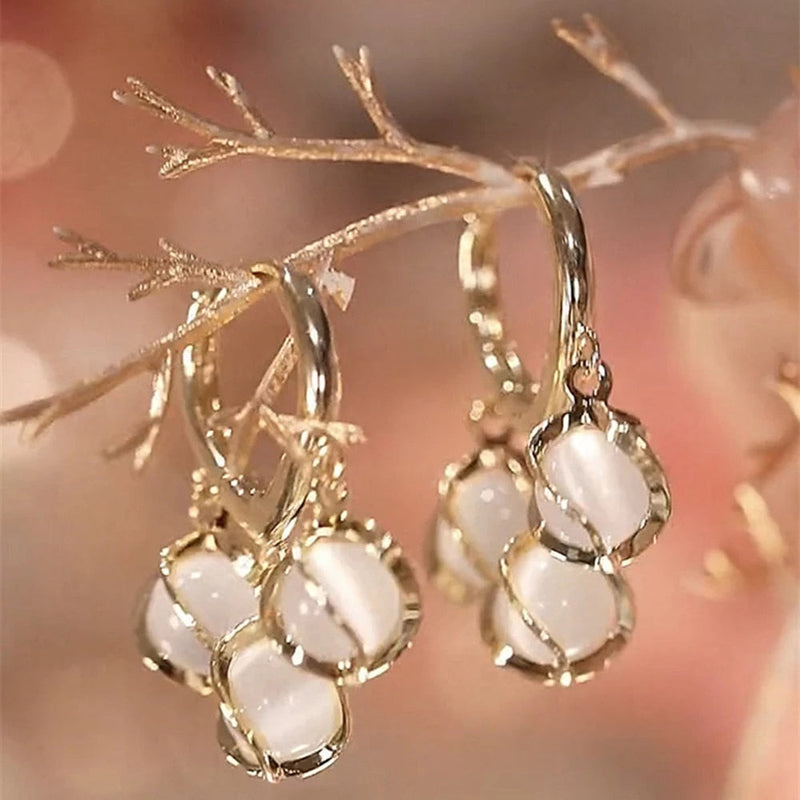 ADICIONAL ARETES ÓPALO